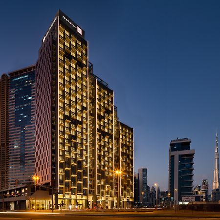 Millennium Atria Business Bay Aparthotel Dubai Ngoại thất bức ảnh The hotel at night